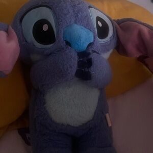 It’s a stitch that when you squeeze the stomach, his ear flip flop